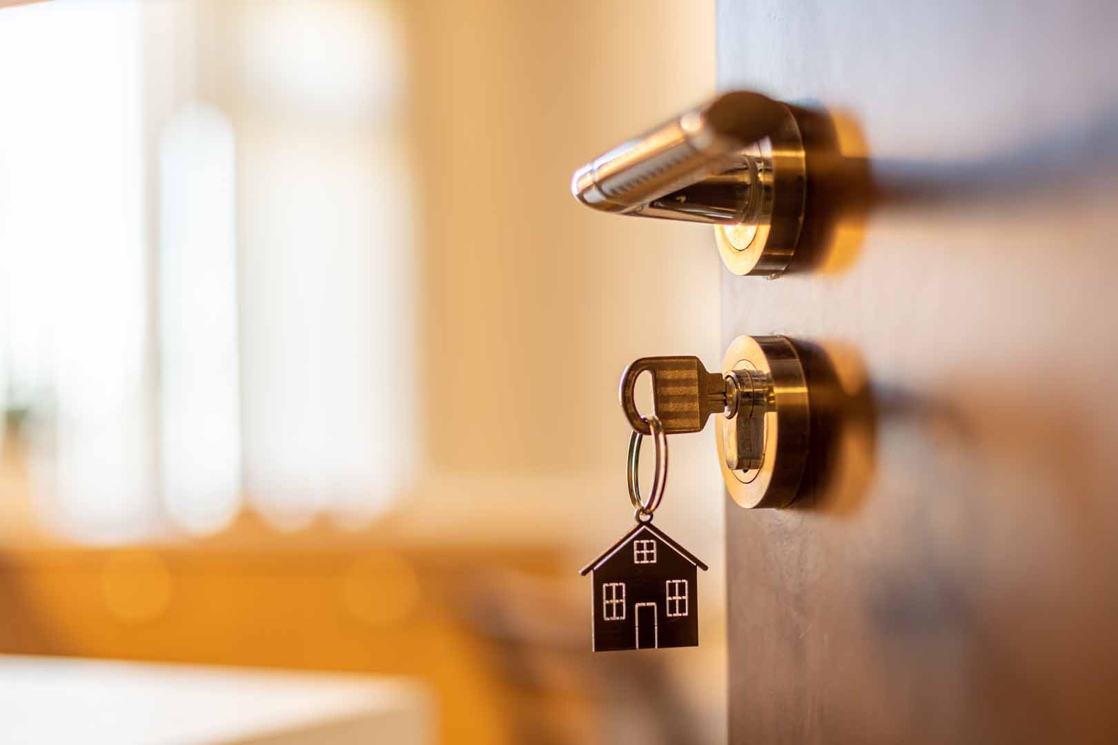 Open,Door,To,A,New,Home.,Door,Handle,With,Key